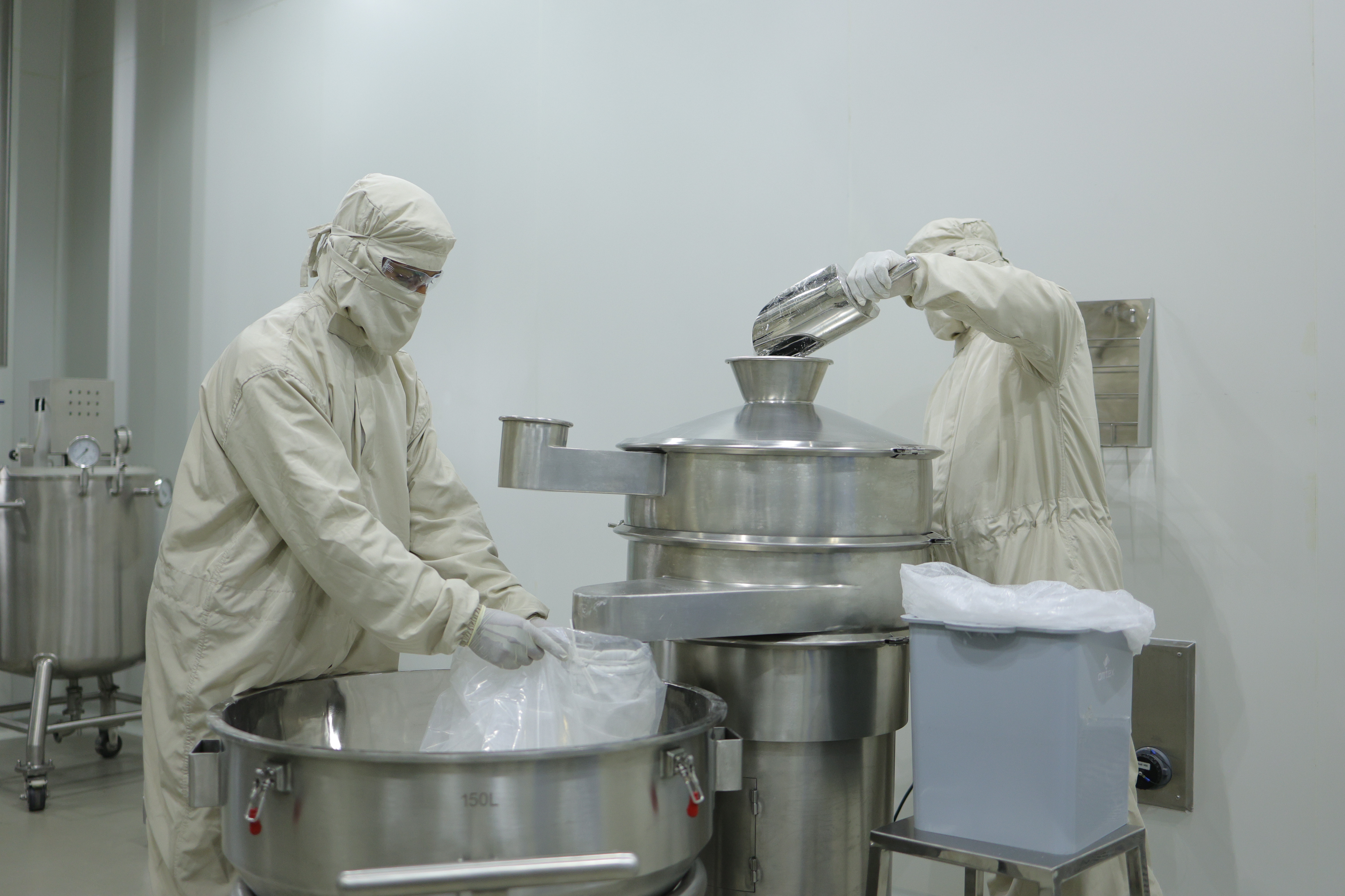 Dycine Pharma facility — operators sieving
